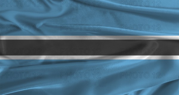 Flag of Botswana with fabric textured background. Close up of National flag of Botswana with realistic texture