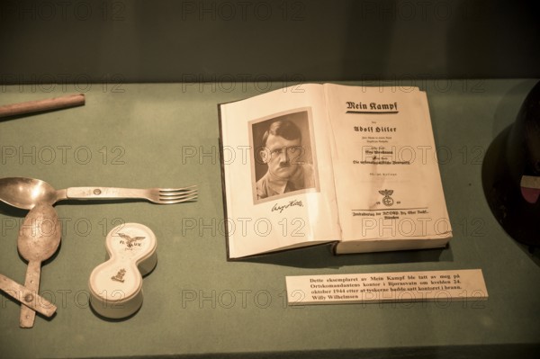 Book Mein Kampf with portrait and signature of Hitler in a museum exhibition at the Kiberg Partisan Museum, Troms, Norway