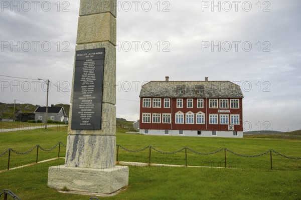 Kiberg, Troms, Norway, memorial in front of the Partisan Museum in the background on the Varanger Fjord