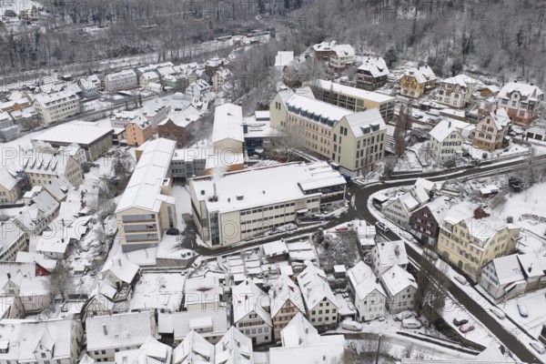 Bird's eye view of snowy town with hills and roads, Calw, Black Forest, Germany