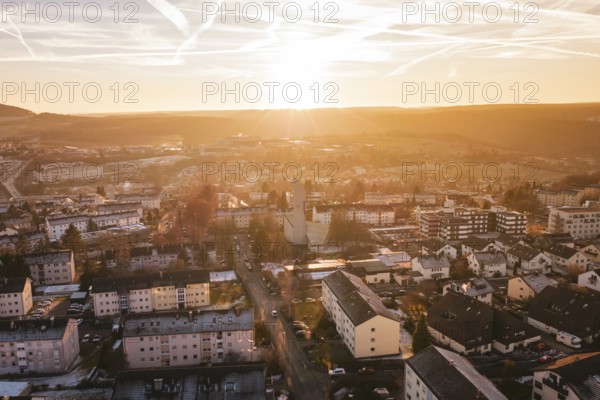 A panoramic view of a city in the light of sunset, with accentuated sky, Calw, Black Forest, Germany