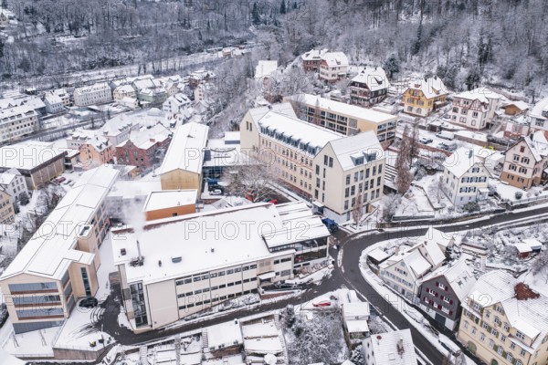 Snowy view of an urban area with buildings and roads, Calw, Black Forest, Germany