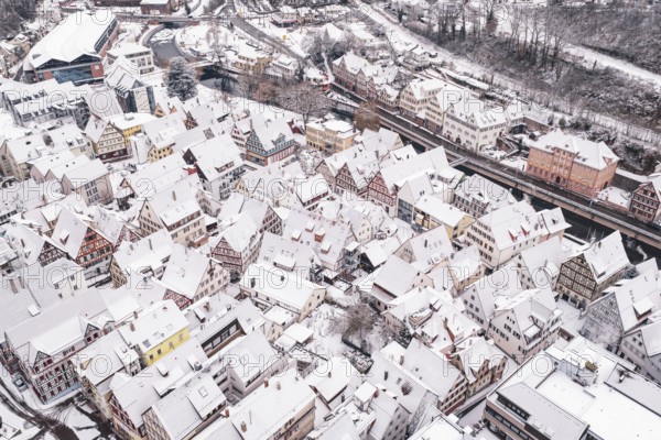 Snowy old town with half-timbered houses from a bird's eye view, winter atmosphere, Calw, Black Forest, Germany