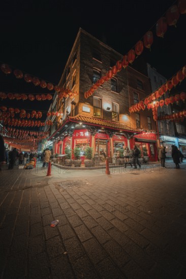 Illuminated street in China Town at night with red lanterns, China Town London, England, Great Britain