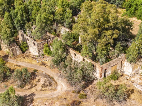 Ruins of former workshop halls, Mina de Sao Domingos, historic copper open-pit mine, aerial view, Portugal