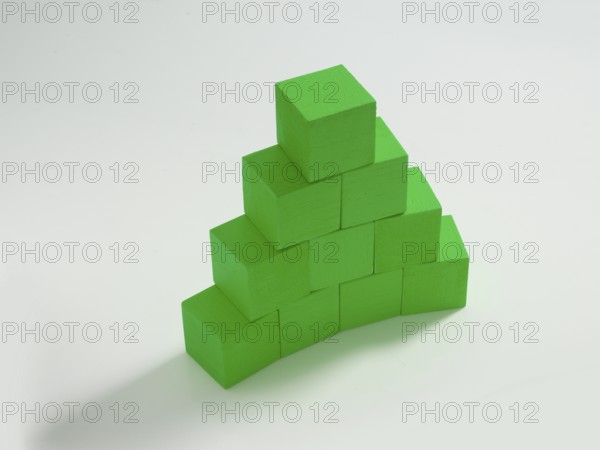 10 green wooden cubes against a white background