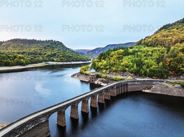 Autumn over Garreg Ddu Dam from a drone, Elan Valley, Caban-Coch Reservoir, Rhayader, Wales, UK
