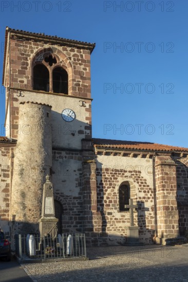 Azerat village. Roman church Saint-Jean-Baptiste . Haute Loire. Auvergne Rhone Alpes. France