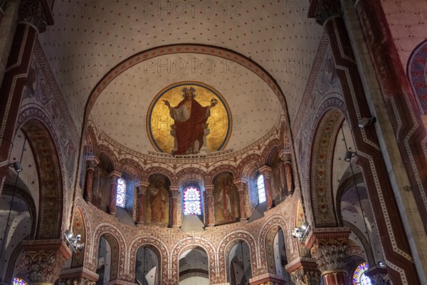 Issoire. Colourful columns of the Roman abbatial St Austremoine, Auvergne Rhone Alpes, France