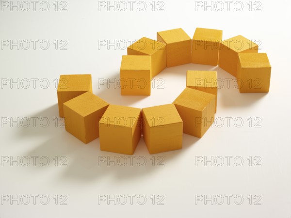 12 yellow wooden cubes against a white background