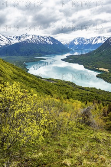 View of snowy mountains and turquoise lake Kenai Lake, Slaughter Ridge Trail, Cooper Landing, Kenai Peninsula, Alaska, USA
