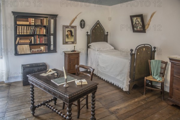 Grazia Deledda (1871-1936) was an Italian writer who received the Nobel Prize in Literature in 1926. Interior in her home, now a museum in Nuoro, Sardinia, Italy