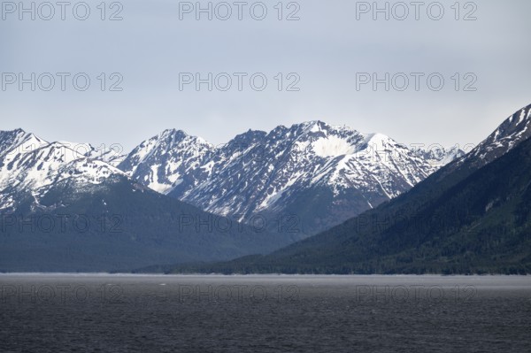 View over the Turnagain Arm estuary to the mountains of the Kenai Peninsula, Anchorage, Alaska, USA