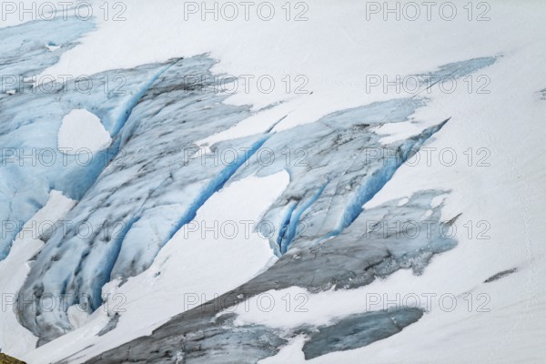 Blue rugged glacier ice with crevasses and snow, detail, Exit Glacier, Kenai Peninsula, Alaska, USA
