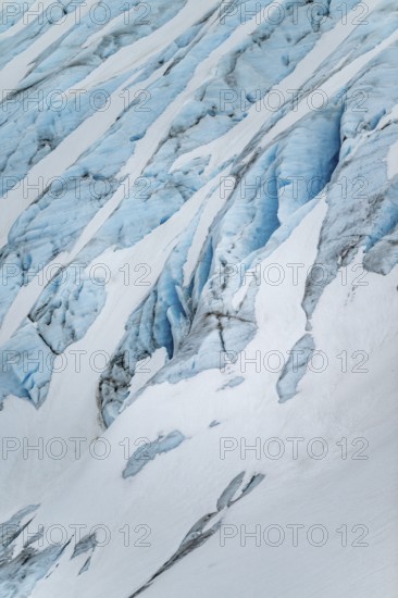 Blue rugged glacier ice with crevasses and snow, detail, Exit Glacier, Kenai Peninsula, Alaska, USA