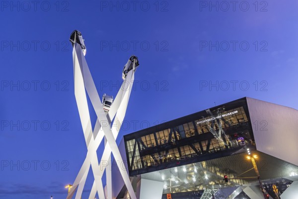Inspiration 911 artwork by Gerry Judah in front of the Porsche headquarters on Porscheplatz: three steles, each presenting a Porsche 911 at a height of up to 24 meters. Stuttgart, Baden-Württemberg, Germany