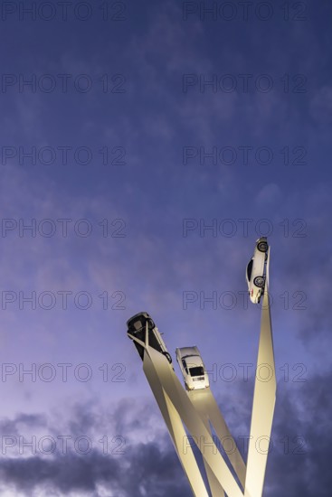 Inspiration 911 artwork by Gerry Judah in front of the Porsche headquarters on Porscheplatz: three steles, each presenting a Porsche 911 at a height of up to 24 meters. Stuttgart, Baden-Württemberg, Germany