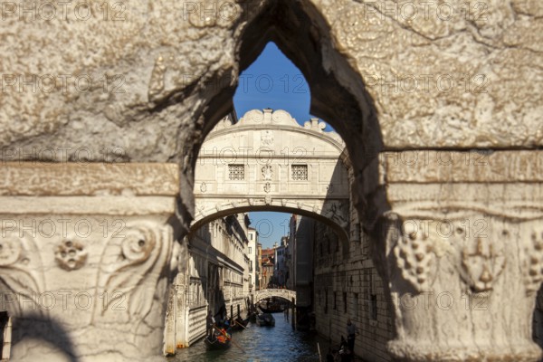 View of the Bridge of Sighs through the railing of the Ponte della Paglia, Venice, Veneto, Italy