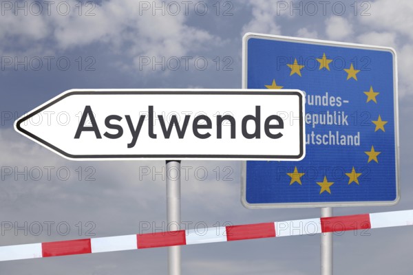 (Photo montage) Directional arrow with the inscription ASYLUM TURNDE in front of a border sign of the Federal Republic of Germany
