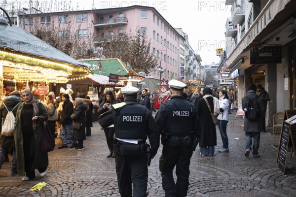 December 22, 2025, police officers showing presence and ensuring security at the Christmas market near St. Paul's Church, Frankfurt, Hesse, Germany