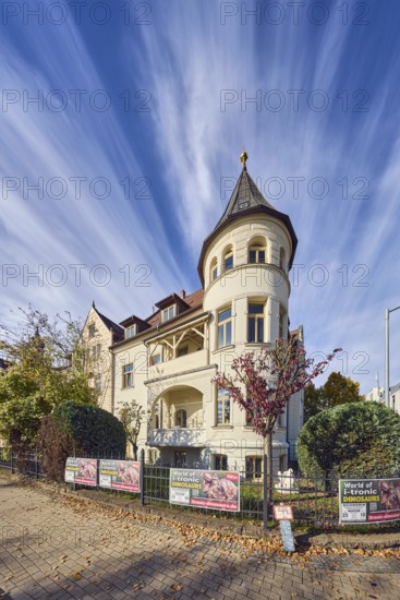 Historic residential buildings, turrets, balcony, façade with windows, trees with autumn leaves, fallen leaves, blue sky, cumulus clouds, Graf-Schack-Allee, Geschwister-Scholl-Straße, Schwerin, state capital, district-free city, Mecklenburg-Western Pomerania, Germany