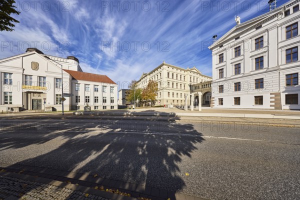 State Archive, University, State Chancellery, historic buildings, sidewalk, street, trees, shade of a tree, blue sky, cumulus clouds, cirrus clouds, Klosterstraße, Graf-Schack-Allee, Schwerin, state capital, district-free city, Mecklenburg-Western Pomerania, Germany