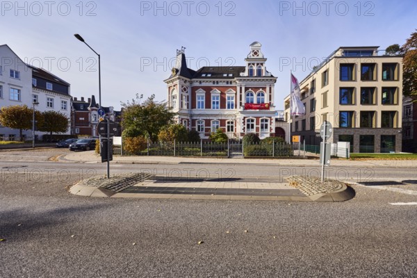German administrative union Mecklenburg-Western Pomerania - DVG MV, dbb civil service association and tariff union, office, historic building, pedestrian crossing, central island, lantern, trees, bushes, blue sky, cloudless, intersection Graf-Schack-Allee with Heinrich-Mann-Straße, Schwerin, state capital, district-free city, Mecklenburg-Western Pomerania, Germany