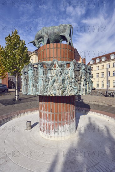 Pastor sin Kauh fountain, bronze sculpture, sculptor Stephan Horota, trees with autumn leaves, general architecture, blue sky, altocumulus clouds, cirrus clouds, slaughtermarket, Schwerin, state capital, district-free city, Mecklenburg-Western Pomerania, Germany
