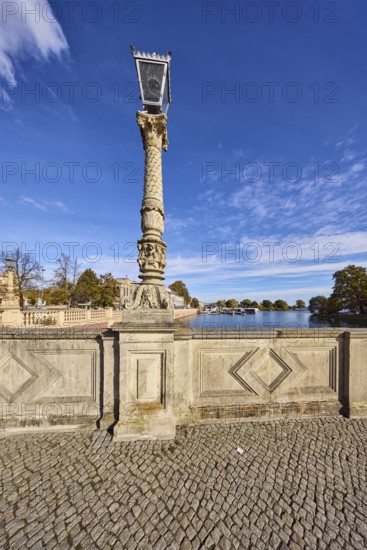 Sandstone wall, lantern, paving stone sidewalk, general architecture, trees, Schweriner Innensee lake, blue sky, altocumulus clouds, cumulus clouds, castle bridge, Lennéstraße, Schwerin, state capital, district-free city, Mecklenburg-Western Pomerania, Germany