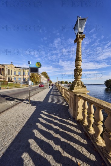 Bus stop Schwerin Castle - Theatre, Schwerin State Museum, renovation, art museum, lantern, sandstone railing, shade of railing, barrier bollard, paving stone sidewalk, street, car, lake Schweriner Innensee, blue sky, altocumulus clouds, Werderstraße, Schwerin, state capital, district-free city, Mecklenburg-Western Pomerania, Germany