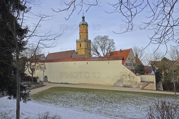 St. Blasius town church built in 14th century with historic city wall in winter with snow, Bopfingen, Härtsfeld, Swabian Jura, Baden-Württemberg, Germany