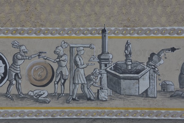 Historical wall by artist group Kollektiv K 2020, wall painting depicting historic city history, medieval knights in armor dueling with pistol, stonemasonry, market fountain, church, destruction, contemporary history, house facade, street art, eels, Swabian Jura, Baden-Württemberg, Germany