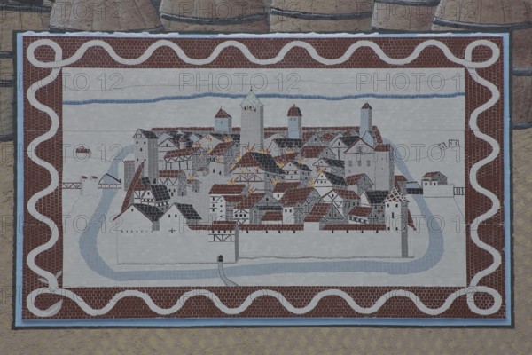 Historical wall by artist group Kollektiv K 2020, wall mosaic with historic city fire, cityscape with city wall and city fortification, painting on city history, house façade, street art, eels, Swabian Jura, Baden-Württemberg, Germany