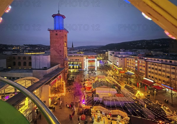 View of the town hall tower with the Christmas market from a Ferris wheel gondola, Hagen, Ruhr area, North Rhine-Westphalia, Germany
