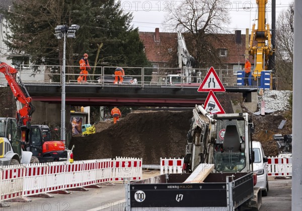 Construction workers with construction machinery on a railway bridge construction site, infrastructure, Witten, Ruhr region, North Rhine-Westphalia, Germany