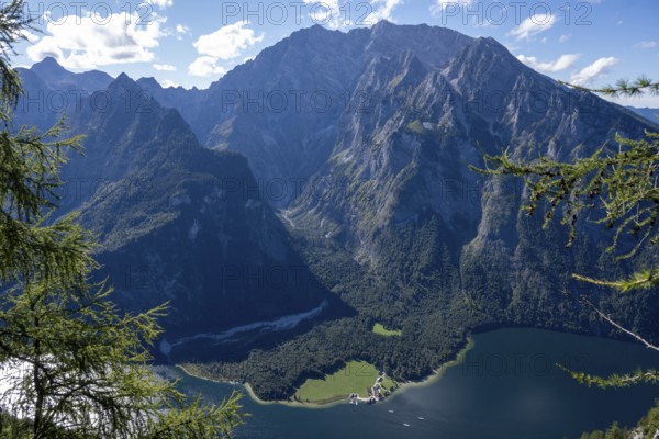 Deep view from Feuerpalfen of Lake Königssee with St. Bartholomä and some ships as well as the Watzmann with its east face, Berchtesgaden National Park, Bavaria, Germany