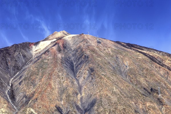 Close-up of Pico del Teide peak under blue sky, Pico del Teide National Park, La Orotava Tenerife