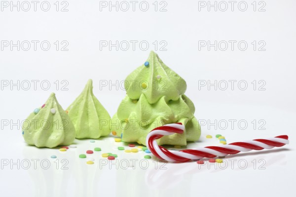 Meringue in the shape of a Christmas tree, Christmas cookies, meringue and candy cane