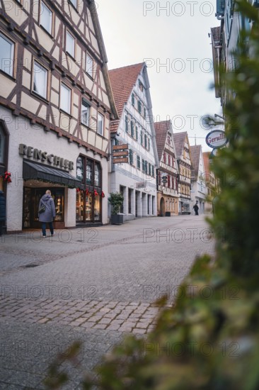 Charming old town street with half-timbered houses and small shops, Herrenberg, Böblingen district, Germany
