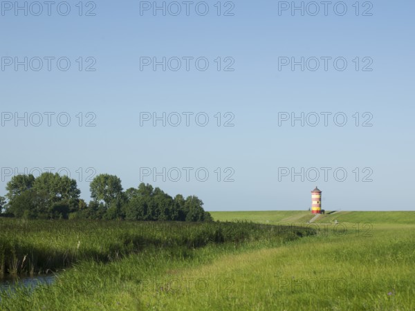 Pilsum lighthouse in the background, Krummhörn Municipality, East Frisia, Germany