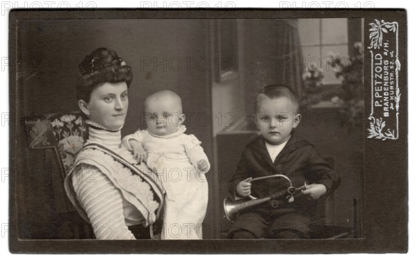 Carte de visite, mother and two small children, toy, trumpet, late 19th century, Brandenburg, Germany