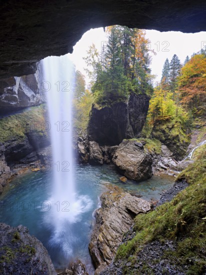 Waterfall mountain list in autumn-colored surroundings, Linthal, Klausenpass, Canton of Glarus, Switzerland