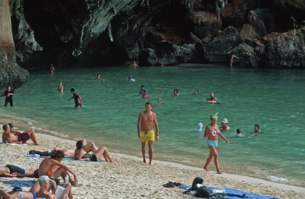 People bathing and sunbathing on Pranang Cave beach, two years in front of the tsunami, Krabi, Thailand, December 2002, vintage, retro, old, historic