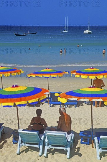 People, umbrellas, boats, Kata Beach, two years in front of the tsunami, Ko Phuket, Thailand, December 2002, vintage, retro, old, historic
