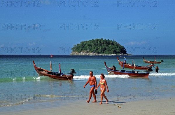 Longtail boats, people, island, Kata Beach, two years in front of the tsunami, Ko Phuket, Thailand, December 2002, vintage, retro, old, historic