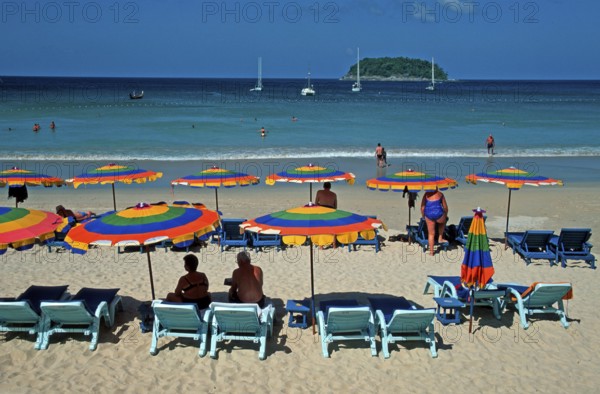 People, umbrellas, boats, island, Kata Beach, two years in front of the tsunami, Ko Phuket, Thailand, December 2002, vintage, retro, old, historic
