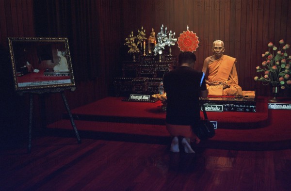 Wax monk at Wat Chalong monastery, believer praying, Ko Phuket, Thailand, December 2002, vintage, retro, old, historic