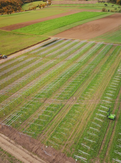 Aerial view of fields with solar frame on green fields, energy transition, construction of PV open space, Baden-Württemberg, Germany
