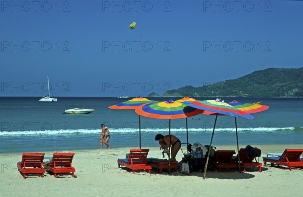 Paragliders, umbrellas, boats, people, Patong Beach, Ko Phuket, two years in front of the tsunami, Thailand, December 2002, vintage, retro, old, historic