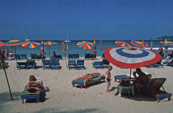 Umbrellas, people, Patong Beach, Ko Phuket, two years in front of the tsunami, Thailand, December 2002, vintage, retro, old, historic